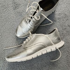 Cole haan 7.5 womens silver casual sneakers.hardly worn great summer addition.